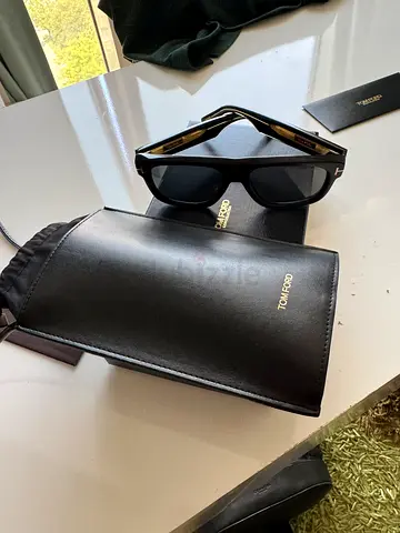 Tom Ford black sunglasses with leather case (brand new). The original price is AED3200