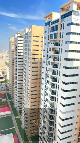 A unique opportunity to live or invest: a two-bedroom apartment in one of the best residential towers in the Emirate of Ajman - Ajman One Tower