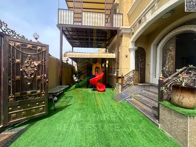Luxury villa for sale in Al Muwaihat 3 | Area 3100 sq ft | Two floors + roof | 5 master bedrooms | Majlis and living room | Maid's room | Kitchen | In
