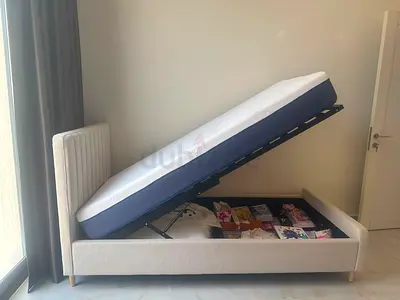 2 single bed with Hydraulic storage with foam mattress in excellent condition as new