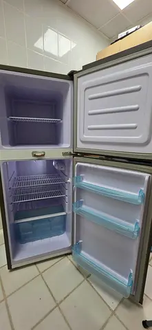 Used Small Double-Door Refrigerator - Compact Top Freezer, Good Working Condition