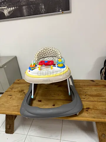 Baby walker with activity tray and padded seat - good condition