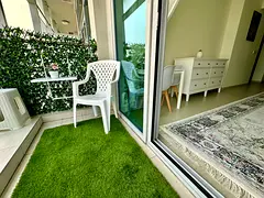 Spacious Living Room with Kitchen Balcony