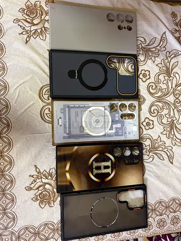 Collection of 5 phone cases compatible with large camera phones (used)