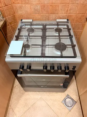 Used freestanding gas oven and 4-burner stove in good condition