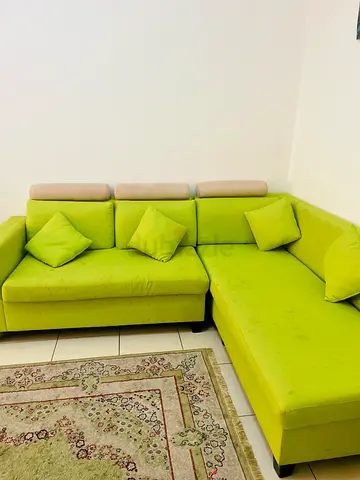 L-shaped lime green fabric sofa with chaise (3-seater corner sofa)