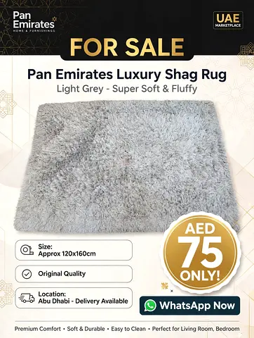 Light grey shaggy rug - good condition, 1.5m x 1m (approx.)