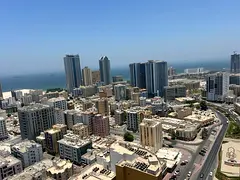 Annual Rent Ajman Corniche 3BR Hall 4 Bath Master Maid's Master Laundry Balcony Sea View Central Gas