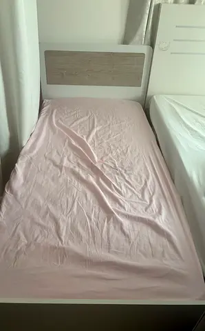 King bed and side tables and single bed