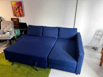 IKEA Blue L-shaped Sofa Bed - Comfortable 3-seater with Pull-out Bed