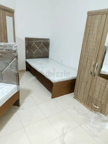 Single bed with mattress and matching wardrobe set - light wood finish
