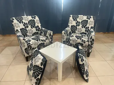 Pair of Floral Accent Armchairs with Cushions and Small White Side Table