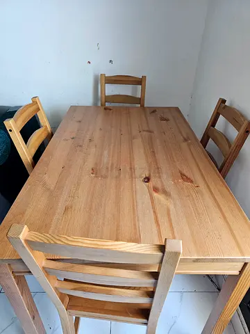 IKEA - Solid Wood Dining Table with Four Matching Chairs