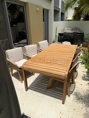 Teak Outdoor Dining Table with 6 Woven Chairs and Cushions perfect condition!