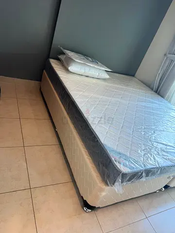 Bed with mattress