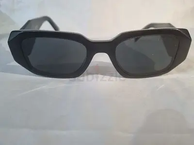 Authentic Prada Symbole Geometric Sunglasses (SPR 17W) – Gloss Black