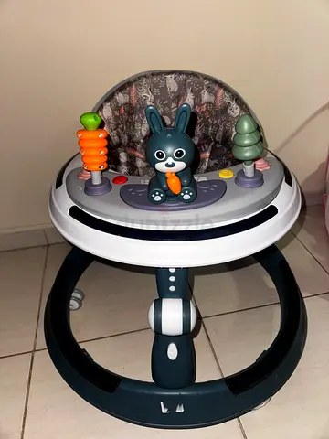 Baby activity jumper/walker with toys - good condition