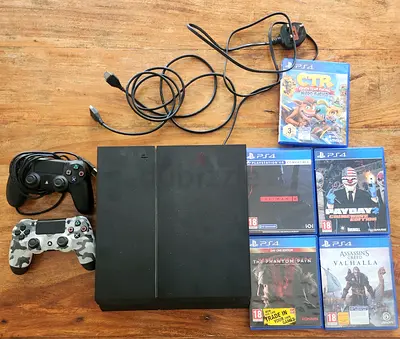 Playstation 4 with 5 Games