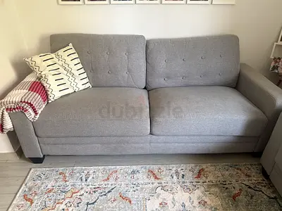 Light grey 3-seater fabric sofa in good condition