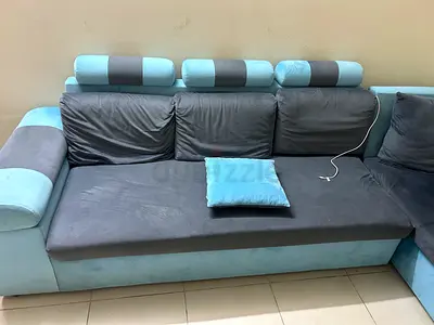 Light blue and grey L-shaped fabric sofa - good condition