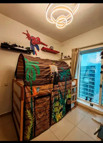 Childrens Ikea Kura Reversiblewooden bunk bed with play tent canopy (jungle theme) 2 mattresses.