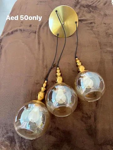 Three-Light Hanging Pendant Lamp with Amber Glass Globes AED 50 great value