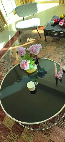 Modern round black glass coffee table with chrome frame,minotti