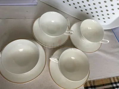 Set of 4 white porcelain teacups with saucers - simple gold rim