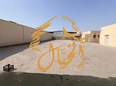 Warehouse 4 corner wall Yard for Rent in Al Saja’a