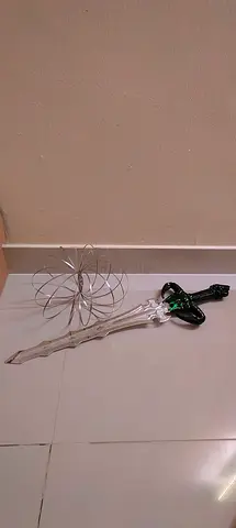 Toy sword and kinetic flow ring