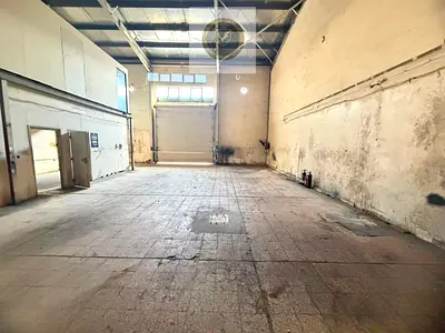 Warehouse for Annual Rent in Industrial Area 15 Sharjah with 2120 Square Feet Two Months Free Mezzanine Bathroom Kitchen Offices High Power Electricit