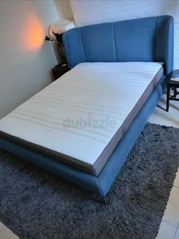 Ikea Queen Bed + Mattress — padded Blue/Grey fabric headboard