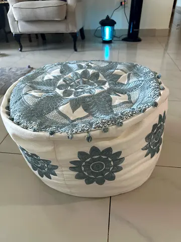 Round embroidered pouf ottoman - cream with grey floral design bean bag