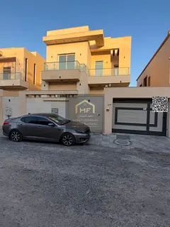Villa for annual rent in Al Muwaihat 3. Consisting of five master bedrooms, a majlis, three living r