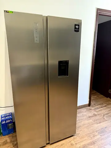Hisense 670L Side-by-Side Refrigerator with Water Dispenser (Silver)