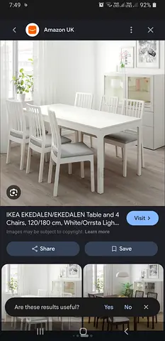 White IKEA dining table with 6 matching chairs - simple modern set