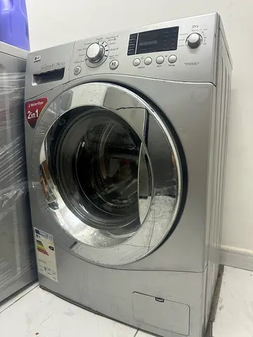 6 kg washing 3 kg drying. LG Silver front-load washing machine - good working condition