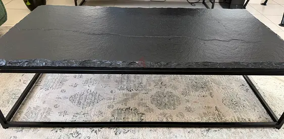 Black Slate Coffee Table Condition: Like new Price : AED 500 Dimensions: L: 140 cm W: 72cm H