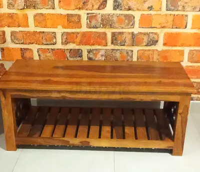 Solid wood bench/coffee table with lower shelf - good condition