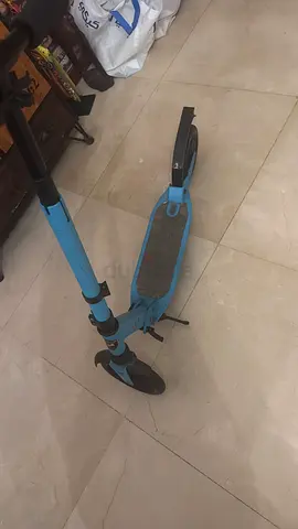 Light blue kids scooter — used, good working condition. Metal frame and extremely durable