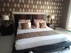 Fully furnished fashionable master bedroom with attached bathroom and balcony in new flatin new flat