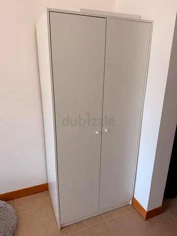 White two-door wardrobe / armoire in good condition
