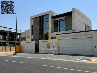 Luxury villa in Al Hooshi, Sharjah, with a modern design, spacious roof and back garden, ready to move in with electricity, water and air conditioning
