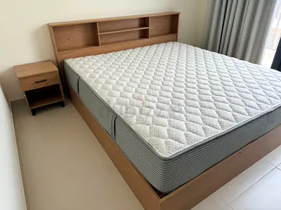 Wooden Double Bed Frame with Mattress and Matching Nightstand and a dresser