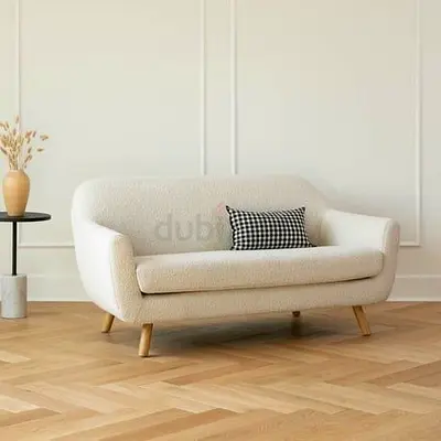 Cream boucle 2-seater sofa with wooden legs