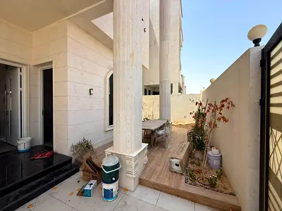 Luxury 5BR villa in Al Amra Ajman, hotel-style features, central AC, premium finishing.