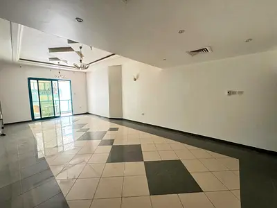3 bedrooms, a living room, 3 bathrooms, and 2 balconies. Payment in 4 or 6 cheques; security cheque required. Located in Al Majaz 3.