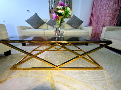 Glass Top Coffee Table with Beautiful Gold Geometric Base