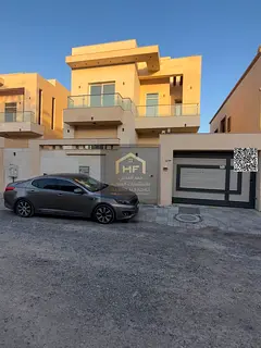 Villa for annual rent in Al Muwaihat 3. Consisting of five master bedrooms, a majlis, three living r