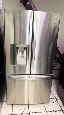 LG French Door Refrigerator with a bottom freezer drawer in a stainless steel finish.